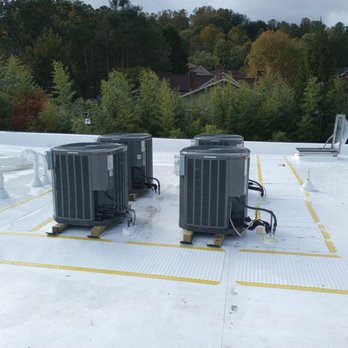 WNC Roofing - Commercial Roofing - Commercial Roof with new TPO, walk pads, pipe boots, and crickets. - Roofing Near Me - Fletcher, North Carolina WNC Roofing - Commercial Roofing - Commercial Roof with new TPO, walk pads, pipe boots, and crickets. - Roofing Near Me - Fletcher, North Carolina