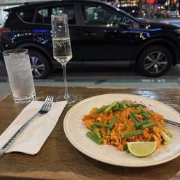 Chicken Pad Thai, sparkling wine, and some awesome people watching on 2nd Street Chicken Pad Thai, sparkling wine, and some awesome people watching on 2nd Street