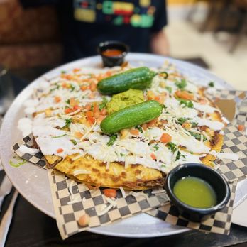 El No Que No Authentic Mexican Kitchen - Large BIRRIA PIZZA! With Consomé and limes on the side - Amazing! - Mexican Near Me - Englewood, Colorado El No Que No Authentic Mexican Kitchen - Large BIRRIA PIZZA! With Consomé and limes on the side - Amazing! - Mexican Near Me - Englewood, Colorado