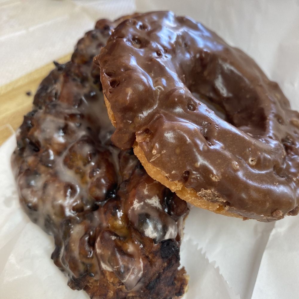 AM Donuts And Kolaches - Half the blueberry fritter and a chocolate old fashioned. - Donuts Near Me - Sweetwater, Texas AM Donuts And Kolaches - Half the blueberry fritter and a chocolate old fashioned. - Donuts Near Me - Sweetwater, Texas