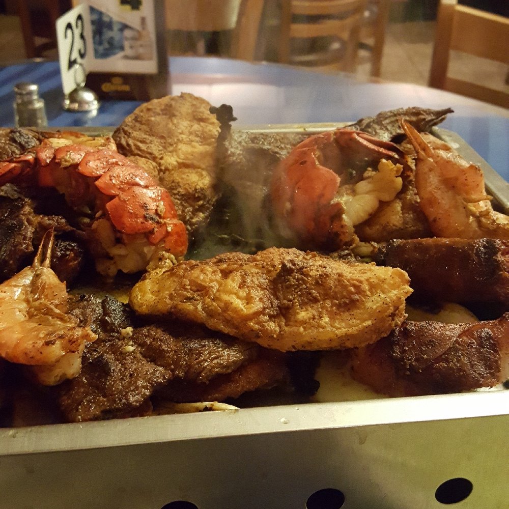 Ordered the parilla.. so much food.. 3 kinds of shrimp, lobster, steak, chorizo, fish, onions, peppers.... at a great price. Delicious. Ordered the parilla.. so much food.. 3 kinds of shrimp, lobster, steak, chorizo, fish, onions, peppers.... at a great price. Delicious.