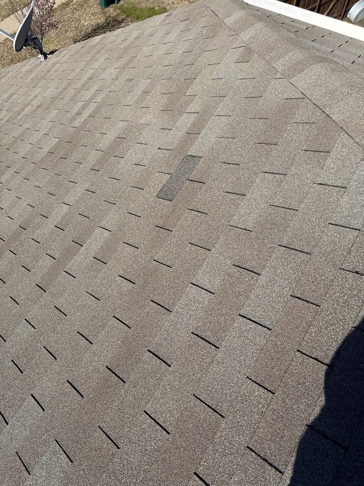 Slide of Apogee Roofing