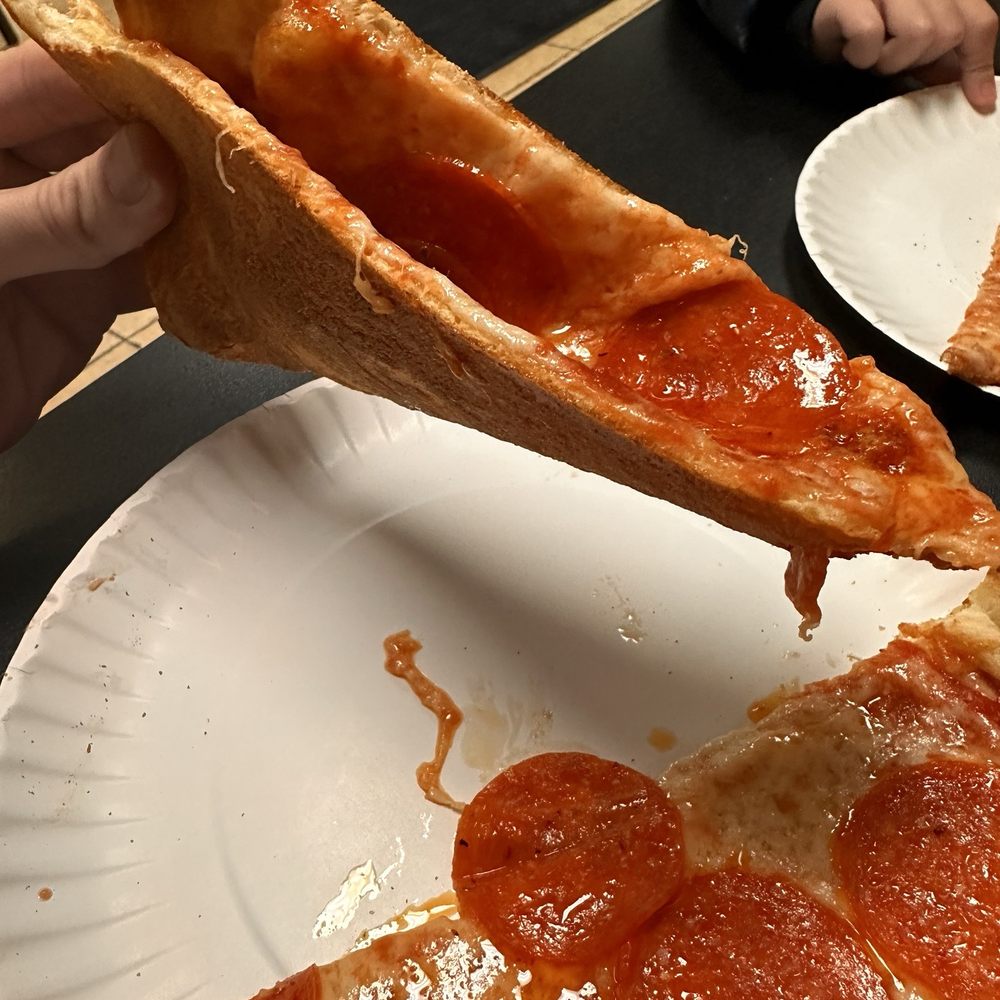 Look at the hold. Look at the thin crust supporting that load. You won't find much better dough construction than Mario's.