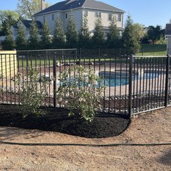 K & K Landscaping - Plantings and stone work around pool.