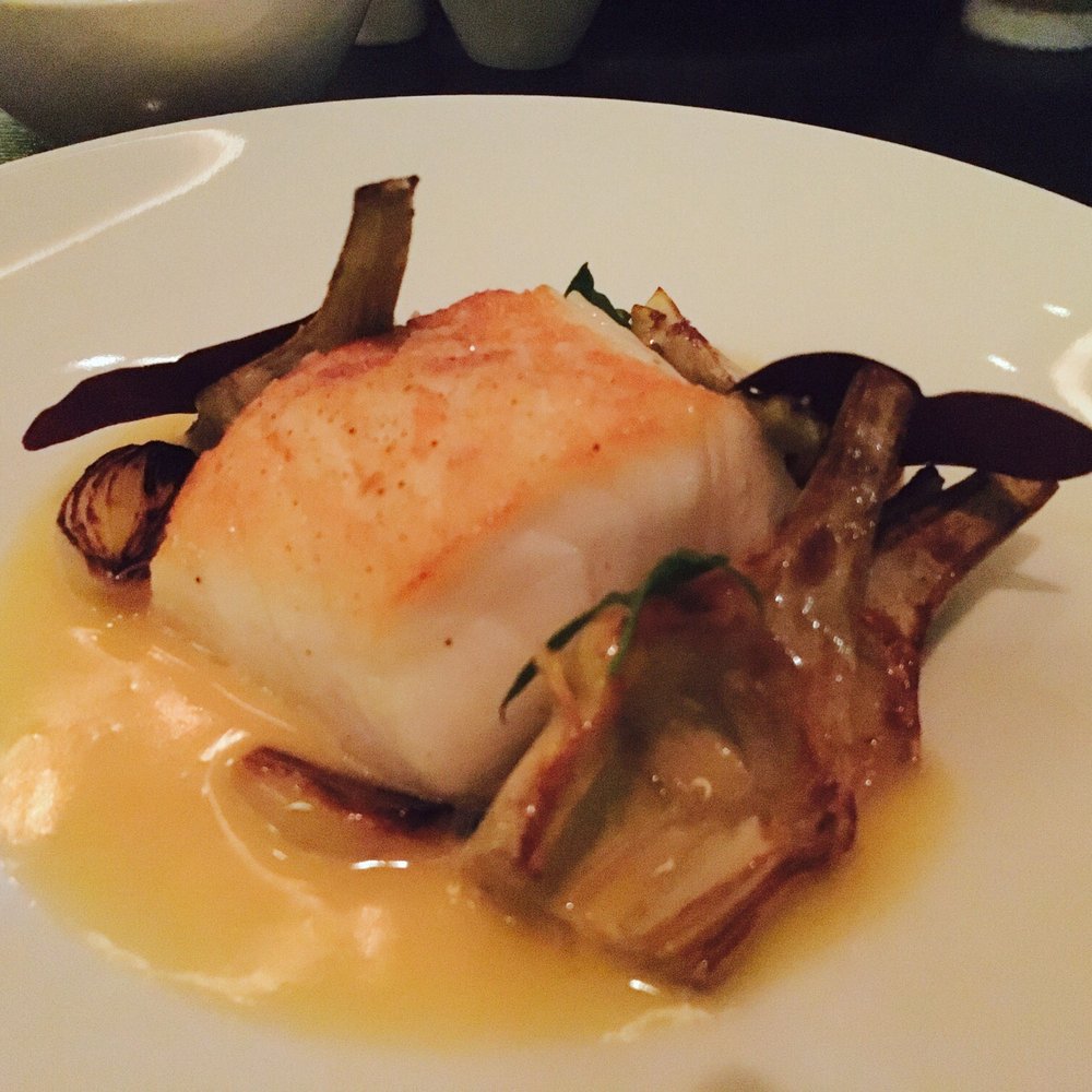 Dinner by Heston Blumenthal - Cod in cider with chard, onions & smokes artichokes (1940) - British Near Me - London, XGL Dinner by Heston Blumenthal - Cod in cider with chard, onions & smokes artichokes (1940) - British Near Me - London, XGL