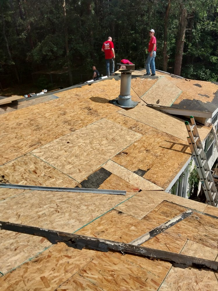 Slide of Tyndal Roofing