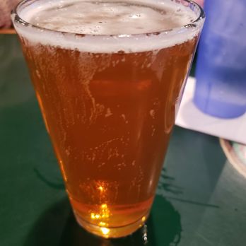 Gators Dockside Winter Springs - a glass of beer on a table - American Near Me - Winter Springs, Florida Gators Dockside Winter Springs - a glass of beer on a table - American Near Me - Winter Springs, Florida