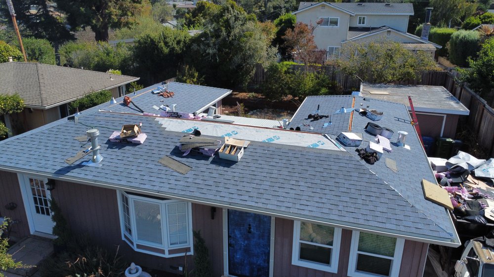 Slide of Six Star Roofing