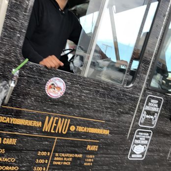 Birreria El Tocayo - a man in a truck - Mexican Near Me Birreria El Tocayo - a man in a truck - Mexican Near Me