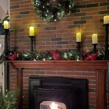 Colonial Flower Shoppe - The cardinals resting on the mantle - Florists Near Me - Somers, Connecticut Colonial Flower Shoppe - The cardinals resting on the mantle - Florists Near Me - Somers, Connecticut