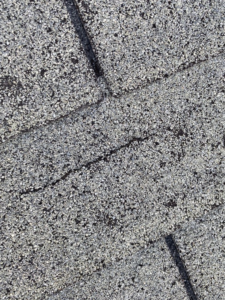 Slide of The Roofing Experts