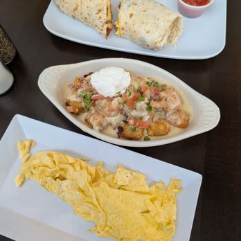 Flying Saucer Draught Emporium - Breakfast burrito, loaded tots, and eggs - Beer Bar Near Me - Dallas, Texas Flying Saucer Draught Emporium - Breakfast burrito, loaded tots, and eggs - Beer Bar Near Me - Dallas, Texas