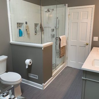 Highpointe Construction - a bathroom with a toilet, sink, and shower - General Contractors Near Me Highpointe Construction - a bathroom with a toilet, sink, and shower - General Contractors Near Me