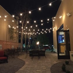Global Brew Tap House - Lighted patio with fountain, fire feature and a 70" outdoor TV