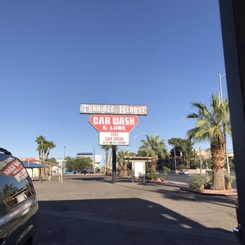 Chevron - a car wash sign in a parking lot - Gas Stations Near Me - Las Vegas, Nevada