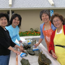 Chinese Community Church - Washing leaves for joong.