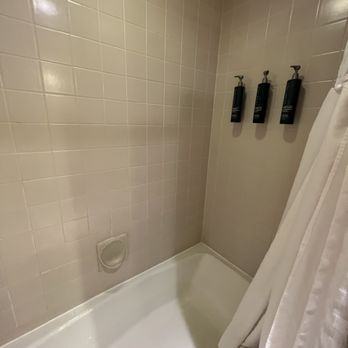 Hilton Orange County/Costa Mesa - Here's the bathroom if you zoom in you can see some pink mildew collecting at the tub. - Hotels Near Me - Costa Mesa, California Hilton Orange County/Costa Mesa - Here's the bathroom if you zoom in you can see some pink mildew collecting at the tub. - Hotels Near Me - Costa Mesa, California