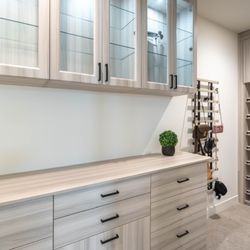 The Tailored Closet of Carlsbad, Palm Desert & Temecula - Custom Closet with shoe organization.