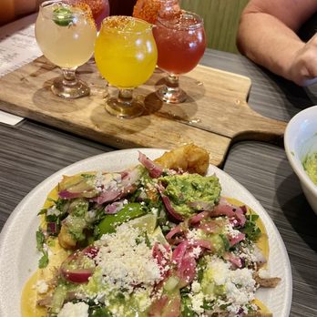 La Casita Olvera - Taco Tuesday - piled on the toppings. Flight of margaritas in the back. - Mexican Near Me - Foothill Ranch, California La Casita Olvera - Taco Tuesday - piled on the toppings. Flight of margaritas in the back. - Mexican Near Me - Foothill Ranch, California