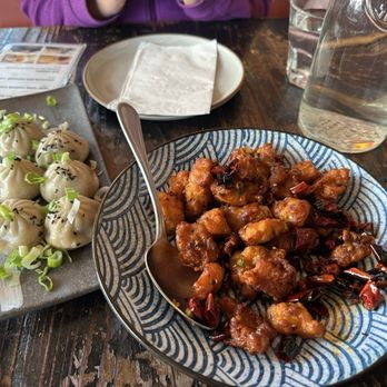 United Dumplings - Q1. Mini Pan-fried Pork Bun (6) R111. Sichuan Chicken - Chinese Near Me - San Francisco, California United Dumplings - Q1. Mini Pan-fried Pork Bun (6) R111. Sichuan Chicken - Chinese Near Me - San Francisco, California