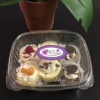 Cheesecake Dreamations - Top row: Raspberry with oreo crust, Lemon, Oreo Bottom row: Mango, Chocolate chip, Oreo - Desserts Near Me - Marina, California