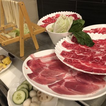IPOT - The spread for our first round: Biang biang noodle, wagyu beef, kurobata pork, and veggies. - Hot Pot Near Me - San Francisco, California IPOT - The spread for our first round: Biang biang noodle, wagyu beef, kurobata pork, and veggies. - Hot Pot Near Me - San Francisco, California