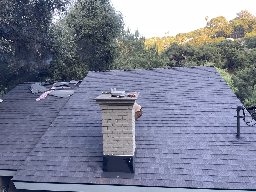 Slide of CV Roofing Services