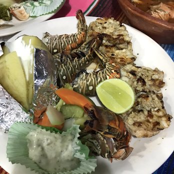 Calypso's - The food is incredible!The grilled lobster was delicious and the Seafood platter was amazing!I enjoyed my time there with my family! - Seafood Near Me - Cancún, ROO