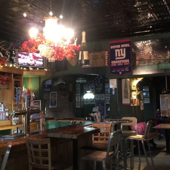 The Deep Inn - a bar with chairs and tables - Bars Near Me - Newark, New Jersey