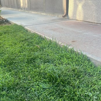 Gothic Landscape - As you can see the grass in the edge wasn't cut. They didn't even bother edging - Landscaping Near Me - Riverside, California Gothic Landscape - As you can see the grass in the edge wasn't cut. They didn't even bother edging - Landscaping Near Me - Riverside, California