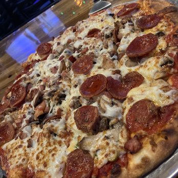 Saints Pizza Pub & Sky Bar - Deluxe Pizza - Sports Bars Near Me - St. Matthews, Kentucky Saints Pizza Pub & Sky Bar - Deluxe Pizza - Sports Bars Near Me - St. Matthews, Kentucky