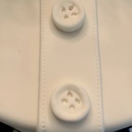 Look at the details in the "stitching" and buttons.