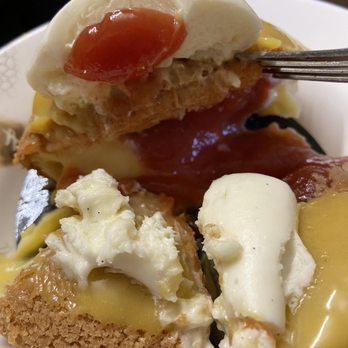 Petit Chou - Passionfruit and Guava Puff oozing with fruity cream (it's not mustard/ketchup!) - Bakeries Near Me - New York, New York