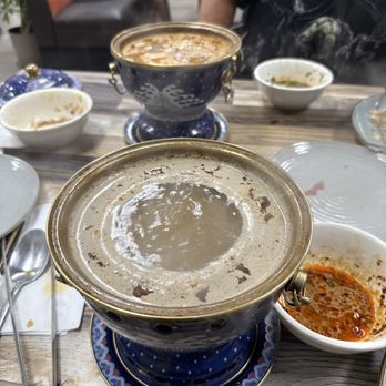 Mongol House - Medium spicy bone broth & my husband got medium spice tomato broth!!! (this is also after 5 plates of meat) - Asian Fusion Near Me - Temecula, California