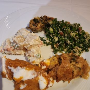 Fogo de Chão - Random holiday offerings (potato salad, sweet potato souffle, stuffing, artichoke) - Brazilian Near Me - Denver, Colorado Fogo de Chão - Random holiday offerings (potato salad, sweet potato souffle, stuffing, artichoke) - Brazilian Near Me - Denver, Colorado