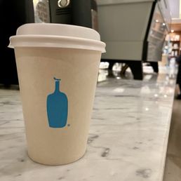 Coffee on the counter of Blue Bottle Coffee in Rockefeller Coffee on the counter of Blue Bottle Coffee in Rockefeller