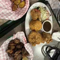 CJ Ephrata Pizza - Spanish rice, beans, salad with fried chicken. Sweet plantains and fried pork bites