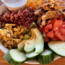 Huge salad with very fresh ingredients.