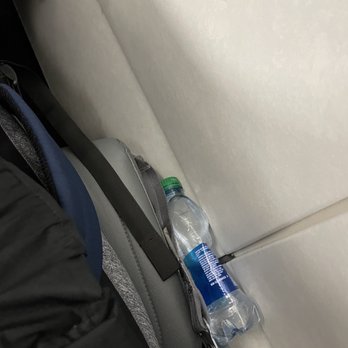Frontier Airlines - bottle stuff into seat - Airlines Near Me - San Francisco, California Frontier Airlines - bottle stuff into seat - Airlines Near Me - San Francisco, California