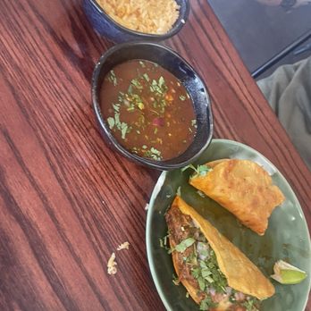 Bibi's Enchiladas & Grill - Side of rice, consume, and 2 Quesabirra Tacos - Mexican Near Me - Gold River, California Bibi's Enchiladas & Grill - Side of rice, consume, and 2 Quesabirra Tacos - Mexican Near Me - Gold River, California