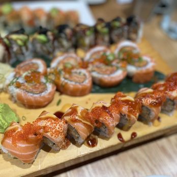 Yoshi Sushi - a variety of sushi on a wooden board - Sushi Bars Near Me - Los Altos, California