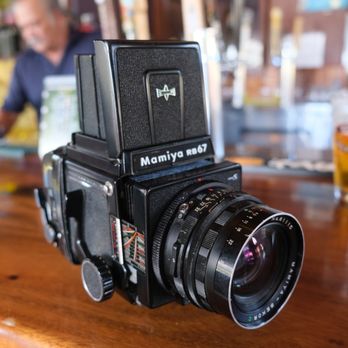 Taps and Hops Eatery - a camera on a bar - Gastropubs Near Me - Kapaʻa, Hawaii Taps and Hops Eatery - a camera on a bar - Gastropubs Near Me - Kapaʻa, Hawaii