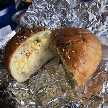 High Octane Cafe & Bakery - Stuffed sausage, egg and cheese bagel with Tots Breakfast - Bakeries Near Me - Waterford Township, Michigan