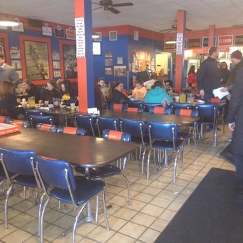 Varsity Pizza - The people of Varsity Pizza enjoying their lunch. - Pizza Near Me - Syracuse, New York Varsity Pizza - The people of Varsity Pizza enjoying their lunch. - Pizza Near Me - Syracuse, New York