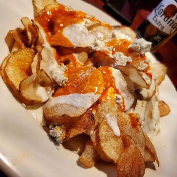 Tavern at Medlock - Chips with Buffalo sauce and blue cheese - Pubs Near Me - Peachtree Corners, Georgia Tavern at Medlock - Chips with Buffalo sauce and blue cheese - Pubs Near Me - Peachtree Corners, Georgia