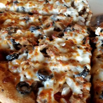 Godfather's Pizza - a slice of pizza on a plate - Pizza Near Me - Billings, Montana Godfather's Pizza - a slice of pizza on a plate - Pizza Near Me - Billings, Montana