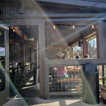 Ivar's River Pub - View of the covered area on the deck - American Near Me - San Marcos, Texas