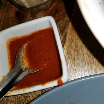 Ghee Indian Kitchen - Side of hot sauce - Indian Near Me - Miami, Florida Ghee Indian Kitchen - Side of hot sauce - Indian Near Me - Miami, Florida