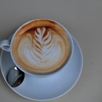 Studio 77 - a cup of cappuccino on a saucer - Breakfast & Brunch Near Me - Pointe-Claire, Quebec Studio 77 - a cup of cappuccino on a saucer - Breakfast & Brunch Near Me - Pointe-Claire, Quebec