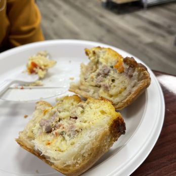 Bake - Quiche - A slice of savory quiche with a flaky crust and filling of cheese, meat, and vegetables on a white disposable plate. - Bakeries Near Me - Summit, New Jersey